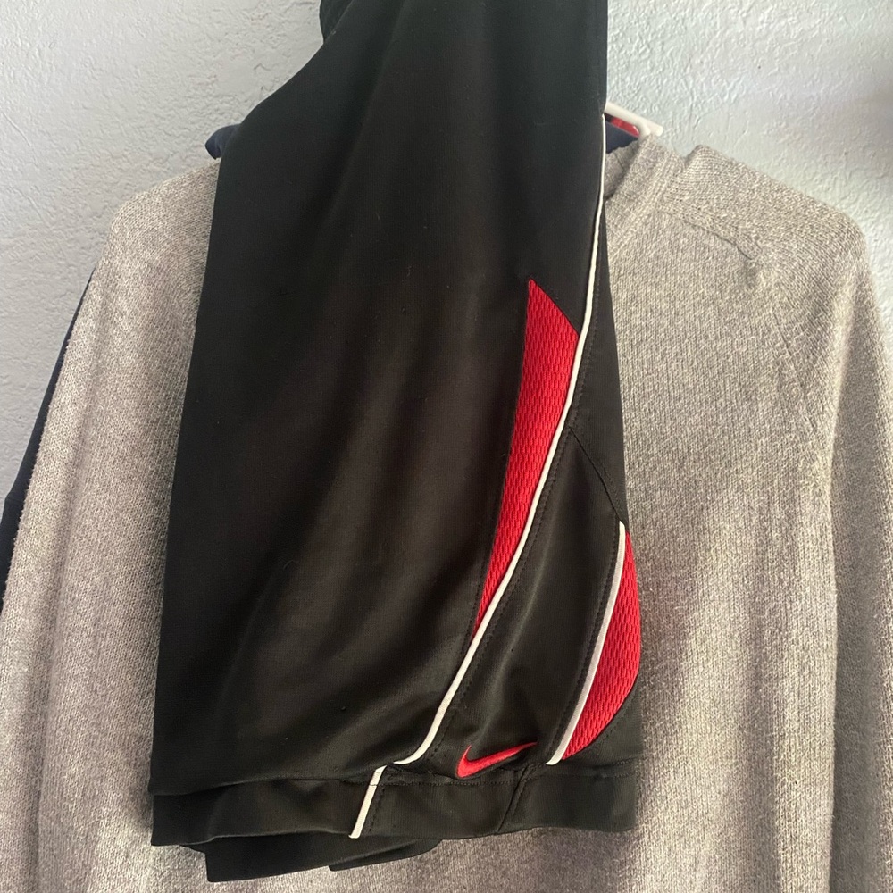 Vintage black and red Nike basketball shorts